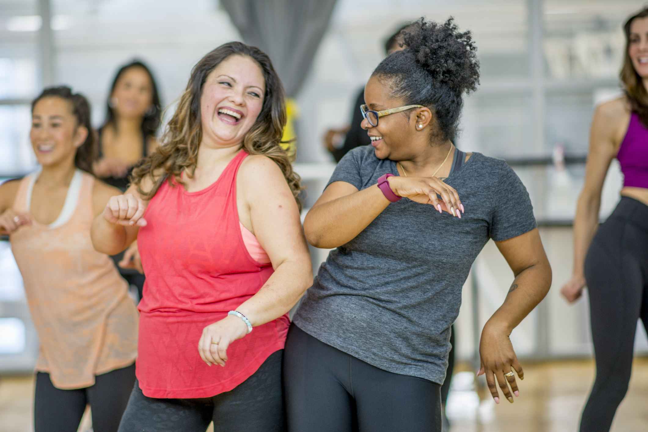 Women dancing together in an exercise class